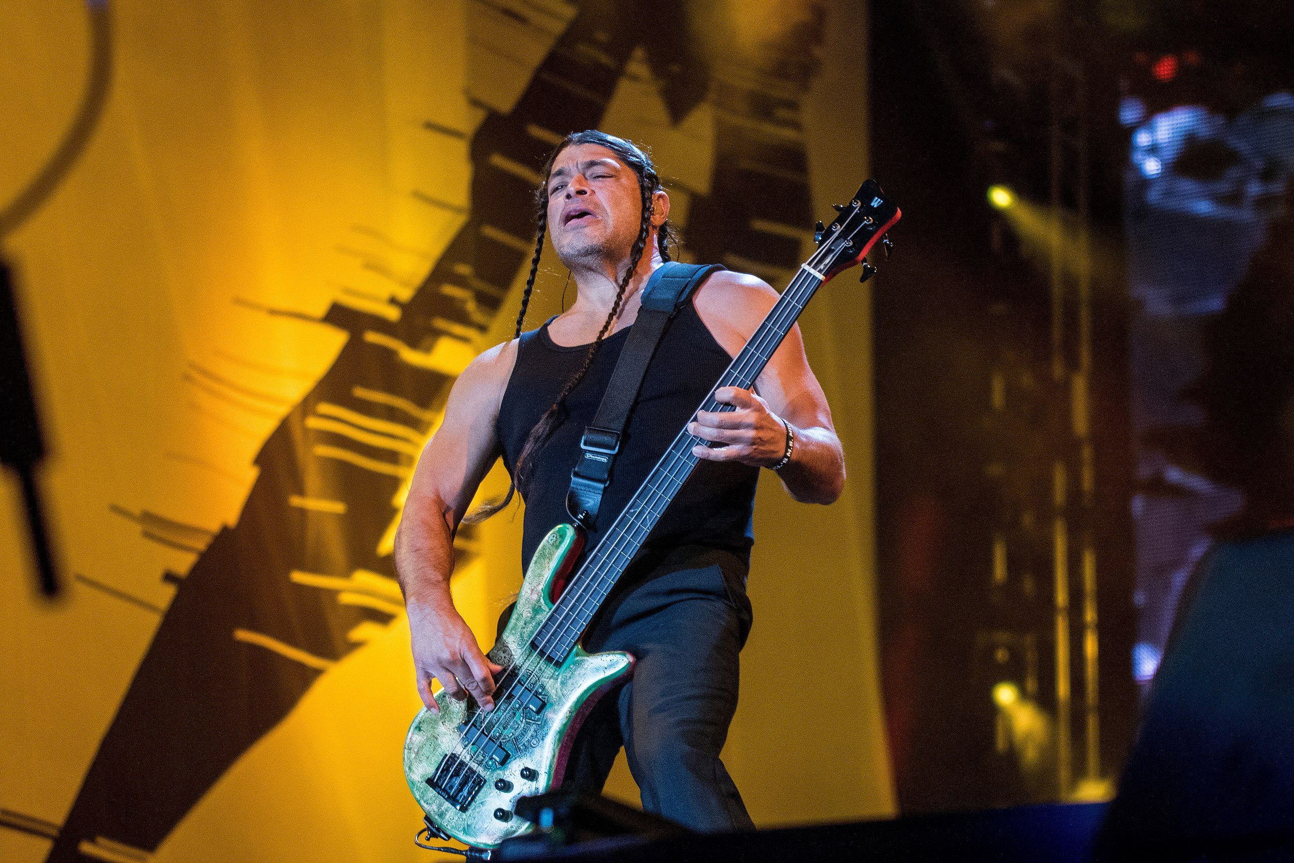 A photo of Robert Trujillo playing live with Metallica.