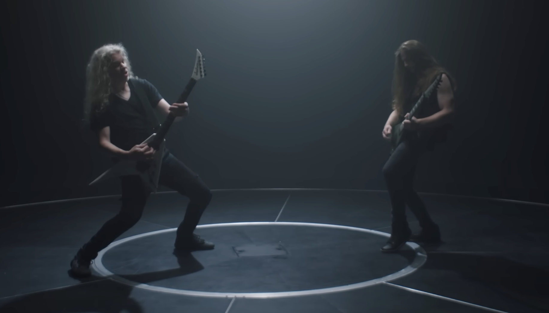 A photo of Jeff Loomis and Brandon Ellis.