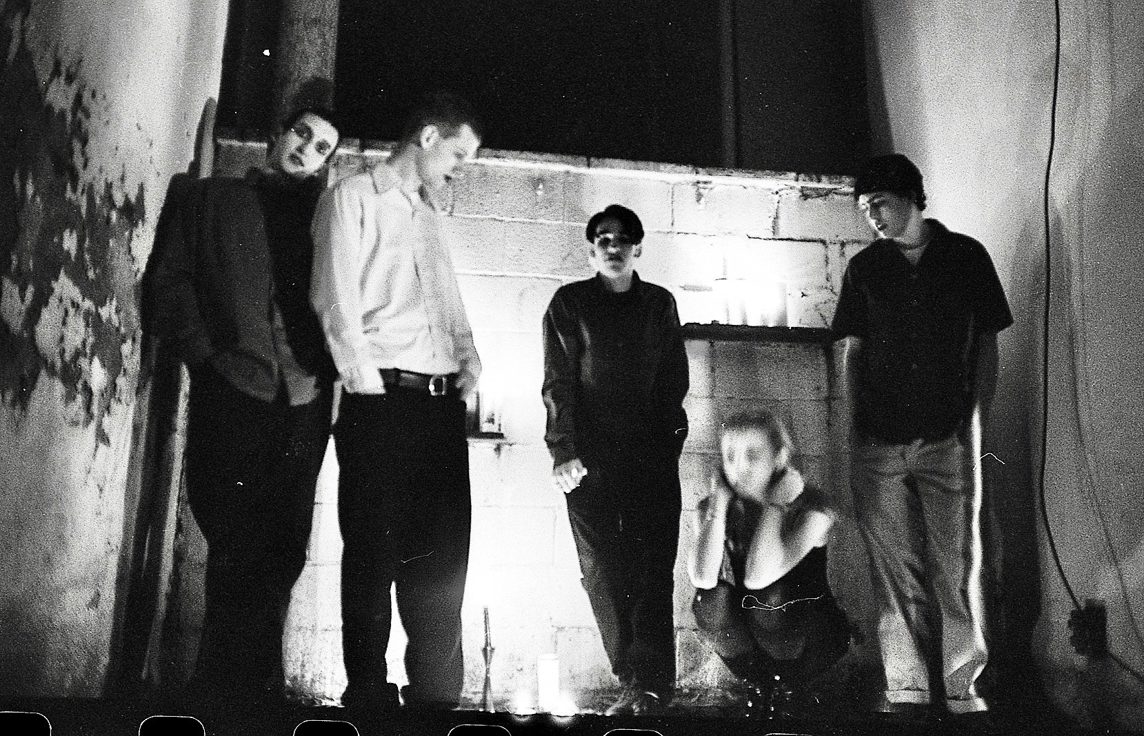 A photo of the band Ink & Dagger as they reissue their entire discography via three stand alone LPs.