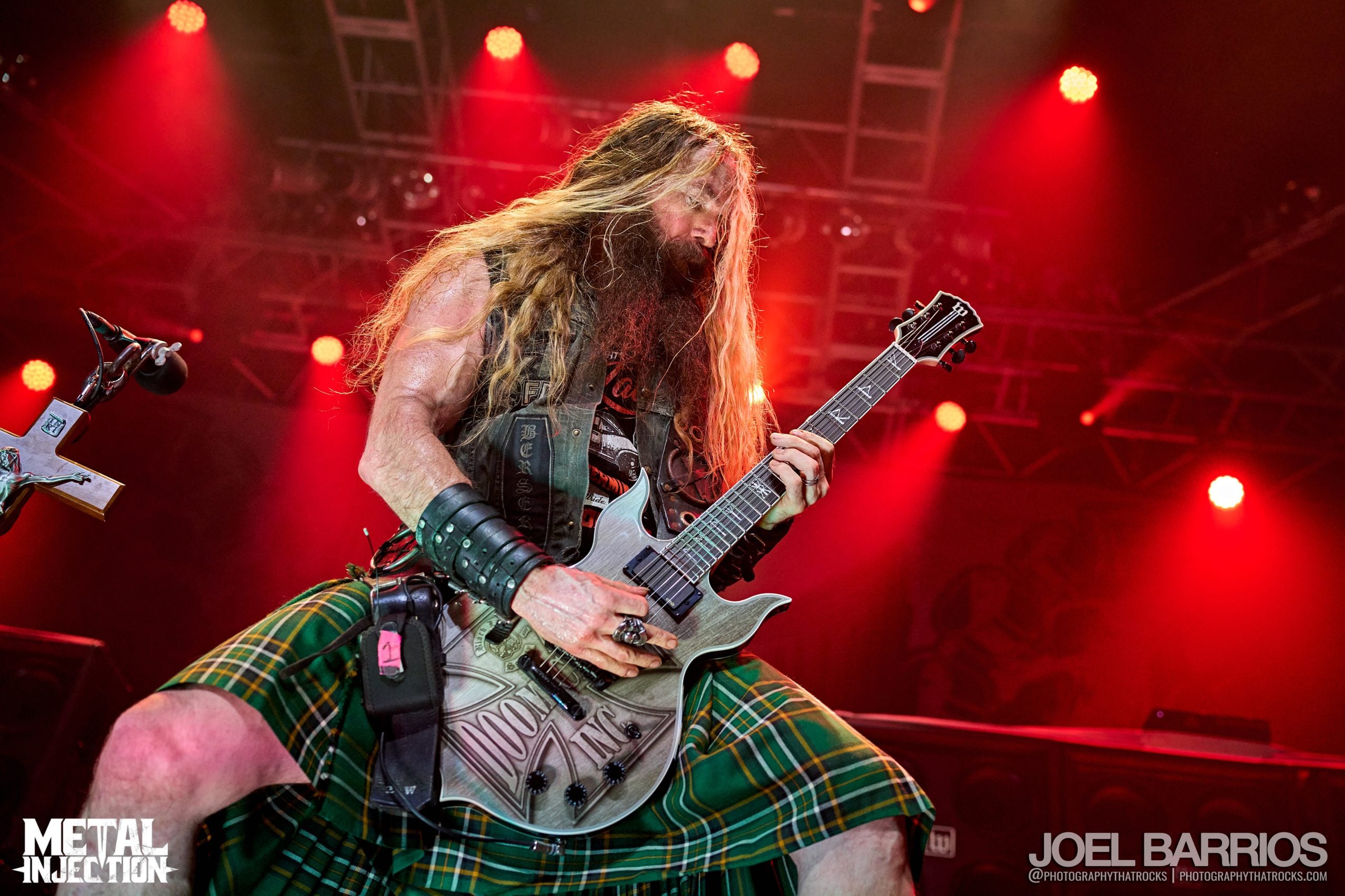A photo of Zakk Wylde playing on stage.